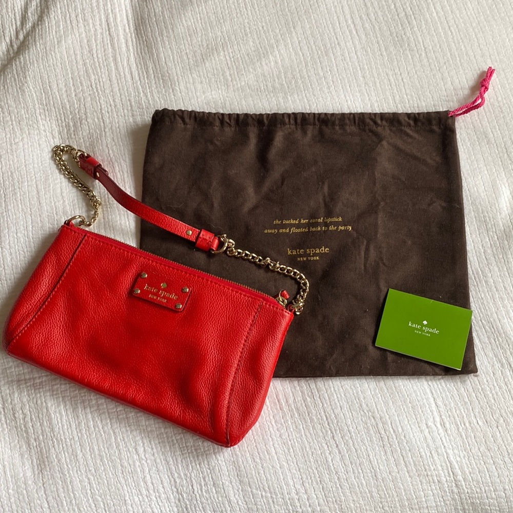 Kate Spade red leather purse with chain strap.